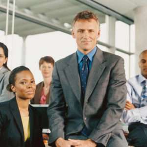 People from diiferent agencies in a picture showing a good relationship between them