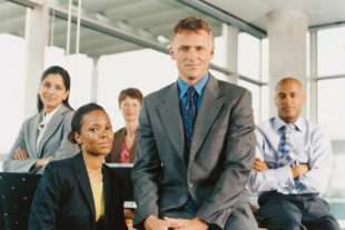 People from diiferent agencies in a picture showing a good relationship between them