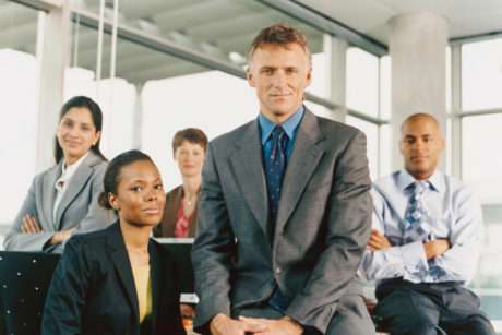 People from diiferent agencies in a picture showing a good relationship between them