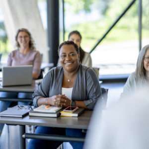 Mature Students Listening in class while attending a superintendency session