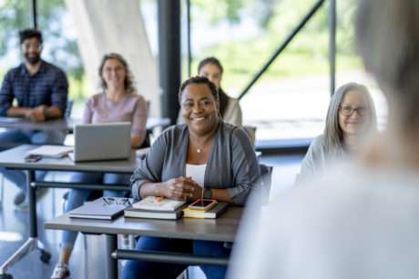 Mature Students Listening in class while attending a superintendency session