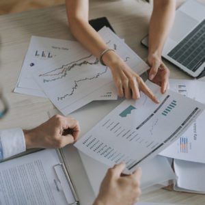 close up high angle Asian businesswoman working with her coworker in meeting room