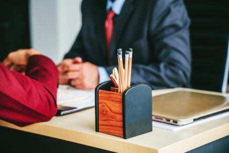 Boss explaining job position in office